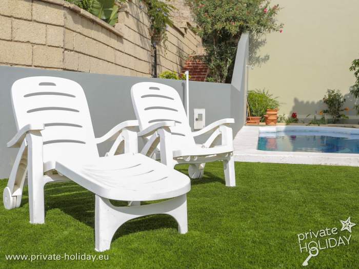 Lawn with deck chairs